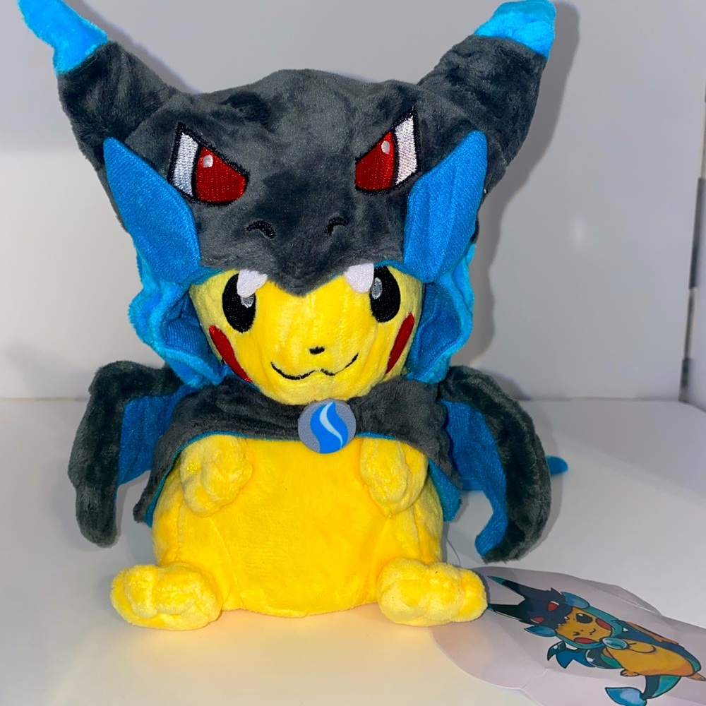 Mega Charizard Poncho Pikachu Plush…..Pokémon. 8/9 inches tall